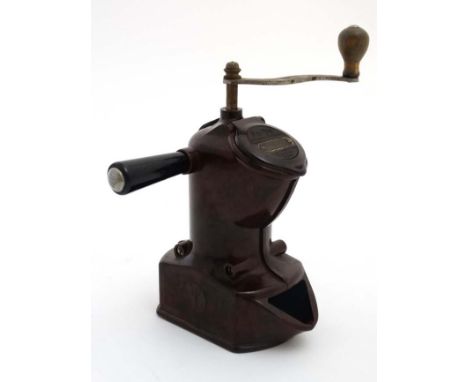 A c1930s 'Pe-De ' Dienes - Reform D.R.G.M D.R.P German red/brown bakelite  coffee grinder by Peter Dienes. 8 1/4'' high CONDI