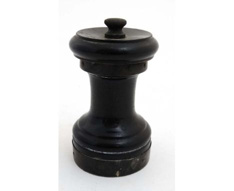 An early 20thC turned wooden pepper mill / grinder with silver mounts hallmarked Birmingham 1911 maker John Grinsell & Sons. 