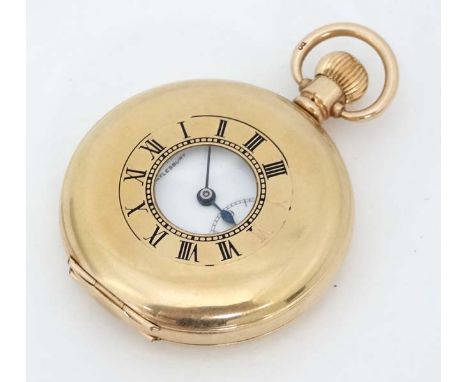 ' Field & Son , Aylesbury ' Half Hunter Pocket Watch : a Top wind 10ct front and back plates pocket watch with DF&S 15 jewel 