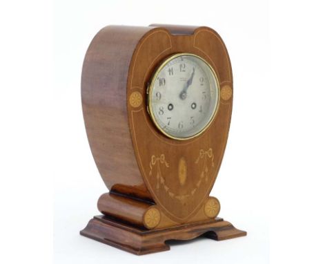 Rowell Oxford : a signed Art Nouveau shaped case inlaid mahogany mantle clock, striking on a coiled gong, having a French ' S