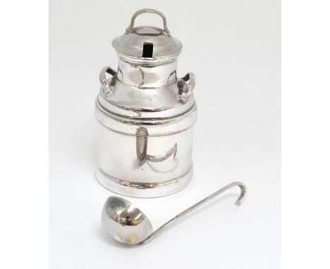 A novelty silver plate small cream pot formed as a churn with ladle. The whole approx 4 1/2" high  CONDITION: Please Note -  