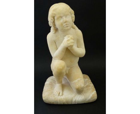 A c.1900 white marble figure of a boy preying on one knee resting upon a squared cushion 14 1/2" high CONDITION: Please Note 