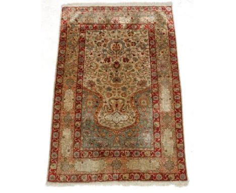 Carpet / Rug:  A fine Herake Turkish Silk prayer rug having forward border with Islamic / Koran words within vignettes, decor