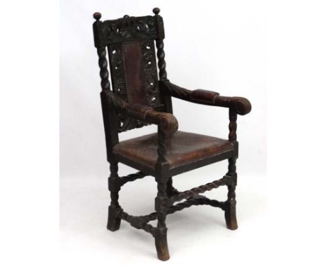 A William and Mary Revival oak chair with embossed leather seat, pack splat and arm pads  leather and having name plate for '