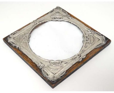 A photograph frame with silver surround, Hallmarked Birmingham 1904 maker Henry Charles Freeman. The whole 5" high  CONDITION