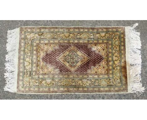 Carpet / Rug:  An antique Turkish Silk  Prayer Rug  with sage green , yellow, black, brown and buff colours etc. 24" wide x 4