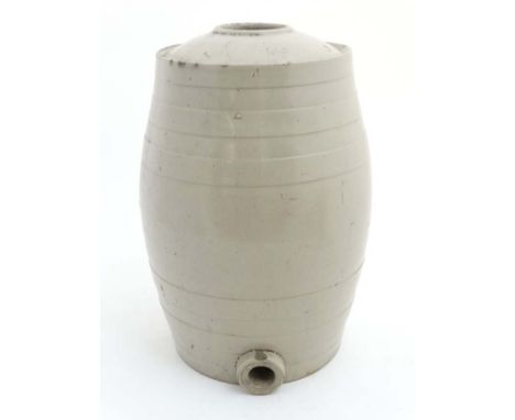 A late 19thC / early 20thC ceramic cream glazed 4 gallon barrel. 17 1/2" high  CONDITION: Please Note -  we do not make refer