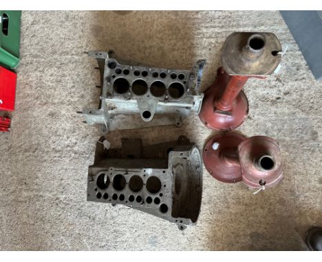 Two Austin 7 crankcases, one for a mag engine, no. M36400, plus a rear axle casing.