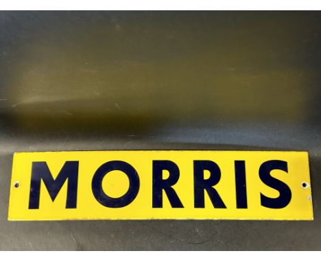 A small enamel sign bearing the name Morris, bright gloss, 22 x 5".
