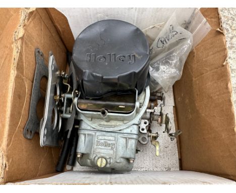 A boxed Holley hi-performance carburettor.