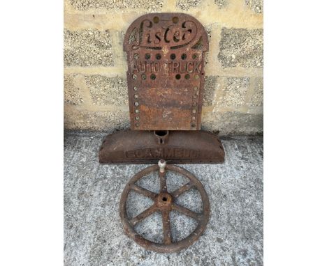 A cast iron Lister Auto Truck plate, a Scammel radiator header tank and a steam engine wheel.