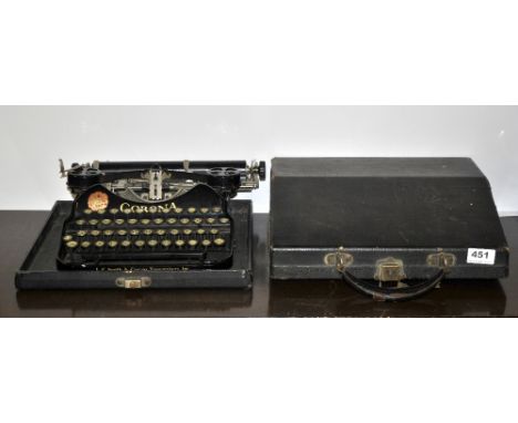 A vintage Corona portable typewriter.