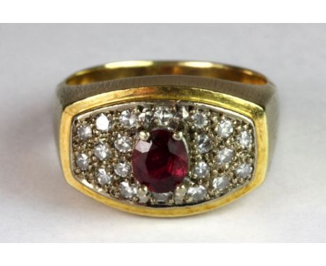 An 18ct yellow gold ring set with a centre ruby surrounded by pave set diamonds (approx 9.7g) (O.5).