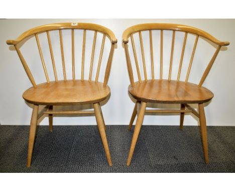 A pair of vintage Ercol chairs.