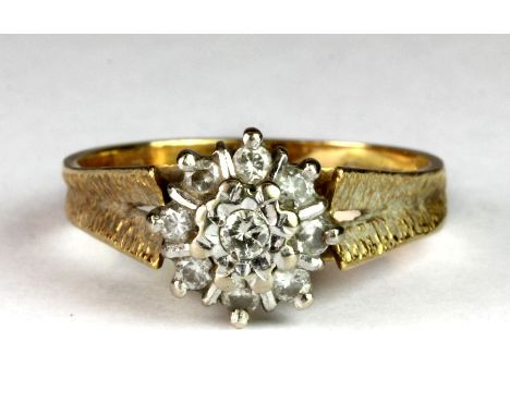 An 18ct yellow gold diamond cluster ring (R).
