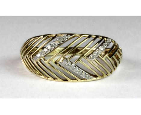 A lovely 9ct gold diamond set dress ring, (Q).