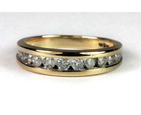 A 9ct gold diamond half eternity ring, (approx. 0.50ct diamonds) (N.5).