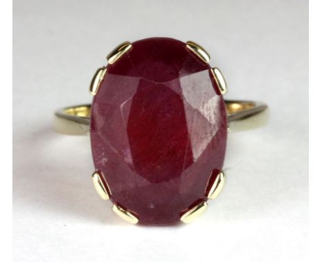 A 9ct yellow gold ring set with a 12.6ct natural ruby with certificate (O).