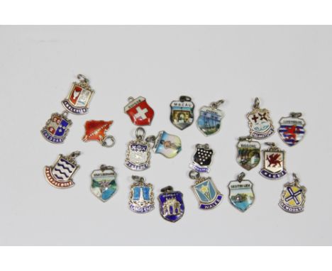 20 vintage enamelled silver souvenir charms including Bombay and Macau.