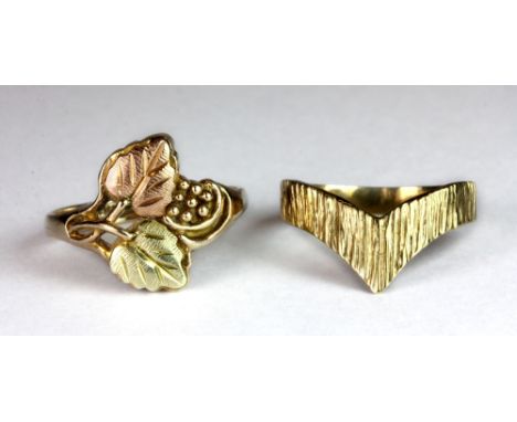 An American 10ct "Black Hills" two colour gold leaf ring (P) with a 9ct gold wishbone ring (P).