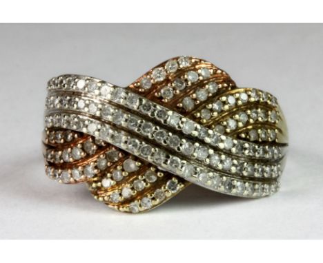 A 9ct three colour gold diamond set dress ring, (approx. 1ct) (S.5).