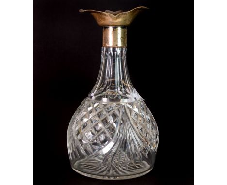 A cut crystal and hallmarked silver triple pouring decanter (no stopper), H. 23cm.