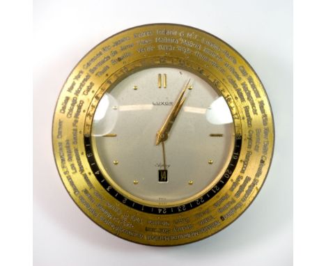 A vintage gilt brass Asprey Luxor world clock, Dia. 11cm.