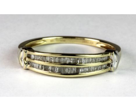 A 9ct gold double row diamond half eternity ring (Q).