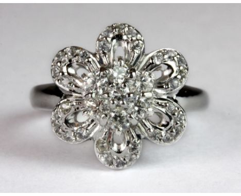 A 9ct white gold diamond set flower cluster ring (approx 0.75ct diamonds) (N).