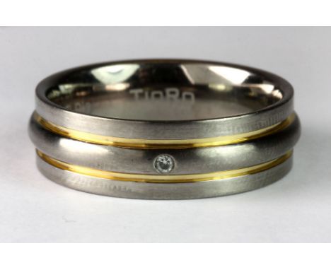 A gentleman's diamond set titanium ring (U).