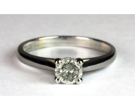 A 9ct white gold diamond solitaire ring, (approx. 0.51ct) (N.5).