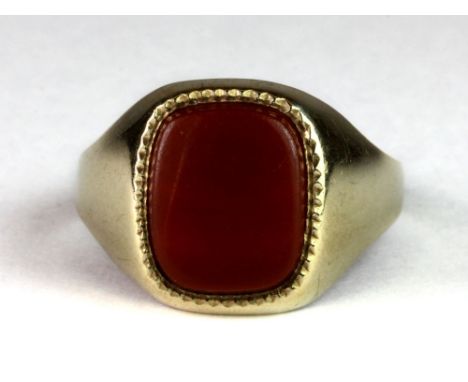 A 9ct gold cornelian set signet ring (T).