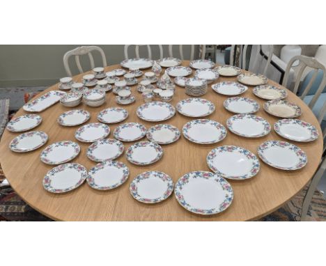 comprising six large dinner plates, ten medium plates, thirteen plates and fifteen side plates, eleven bowls, six tea cups an