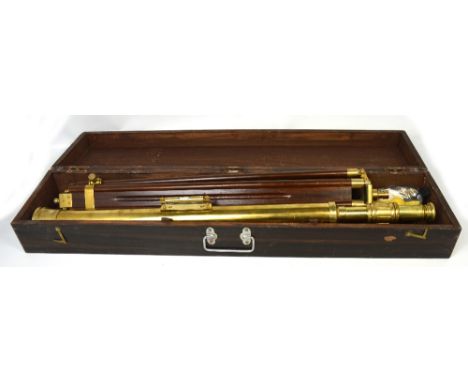 A boxed mid 20th century brass telescope with stand and further accessories. CONDITION REPORT Some age related wear, lenses i