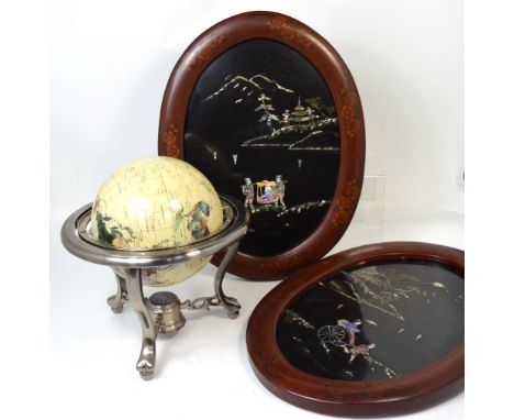 A modern decorative table globe/compass set with gemstones in a chromed frame and a pair of Oriental decorative ebonised pict