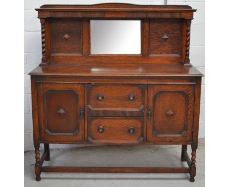An oak mirror back sideboard with barleytwist supports, width approx 140cm and an oak stand raised on tripod support, height 