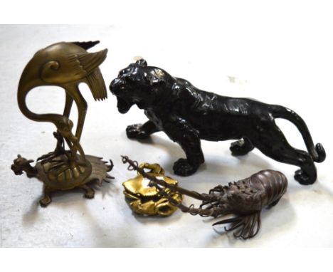 Four various Oriental metalware animals; a crawfish, a brass crab, a crane standing on a turtle shell and a black enamel meta