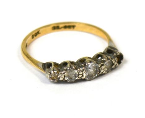 A 9ct yellow gold dress ring set with five white stones, size K, approx 1.6g.