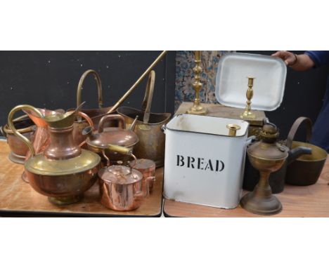 A quantity of metalware to include a copper haystack jug, a copper kettle, a brass jam pan, an enamel breadbin etc.