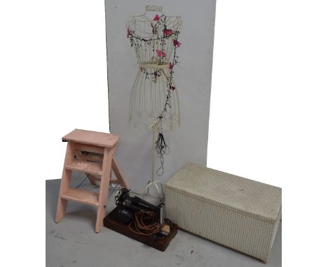 An oak cased Singer sewing machine, a small pink painted ladder, an ottoman and a white wire mannequin (4).