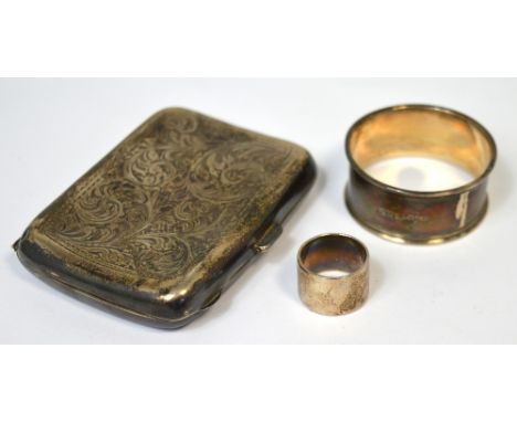 A George V hallmarked silver cigarette case, William Hair Haseler, Birmingham 1922, a hallmarked silver napkin ring and a whi