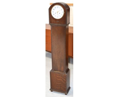 A 1930s oak cased grandmother clock, the dial set with Arabic numerals, height approx 135cm.