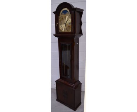 A reproduction mahogany long case clock, the gilt dial set with Roman numerals, height approx 185cm.