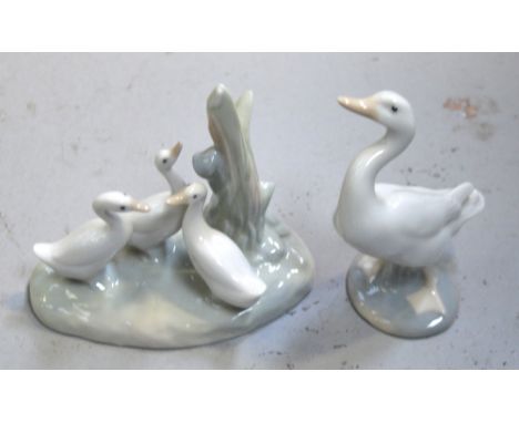 A Nao figure group of geese and a Lladró goose figurine (2).