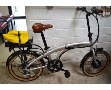A Hopper Urban SE folding bicycle with lithium battery, sold with keys.