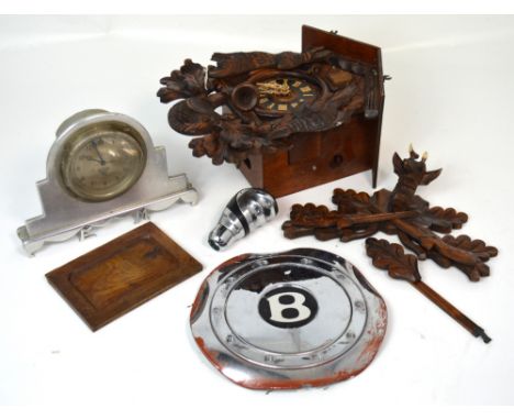 A cuckoo clock and a small quantity of automobilia collectors' items to include a Smiths car clock, silvered dial set with Ar