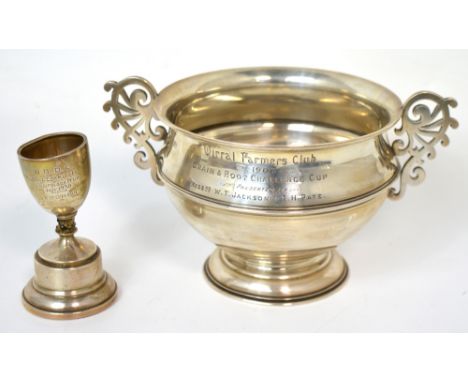 An Edward VII hallmarked silver twin handled trophy bowl, inscribed 'Wirral Farmers Club 1907 Grain and Root Challenge Cup pr