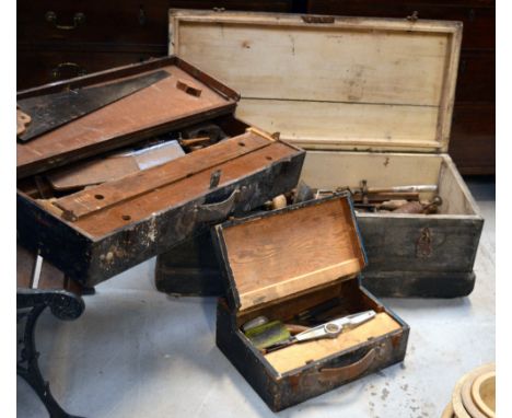 Three large wooden toolboxes and a quantity of tools to include planes, saws etc.