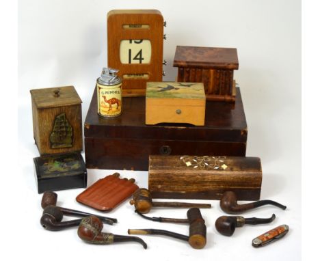 A quantity of pipes to include a Peterson's of Dublin example with sterling silver, a desk calendar, a hip flask, a mahogany 