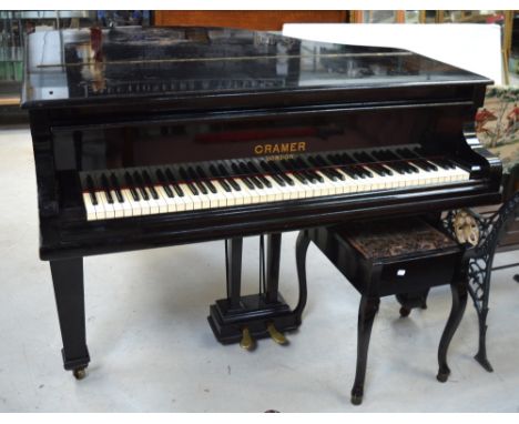 An ebonised J.B. Cramer & Co. Ltd of London baby grand piano (59542  124182  R&D 40147) and a stained wooden floral upholster